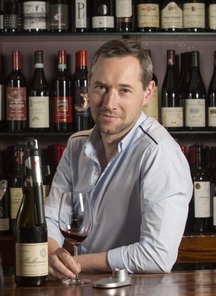 Ian Brosnan of Ely wine bar Ely Place, with a revolutionary device called a Corovin which allows you to extract wine from a bottle without removing the cork. 2/4/2015 Picture by Fergal Phillips.